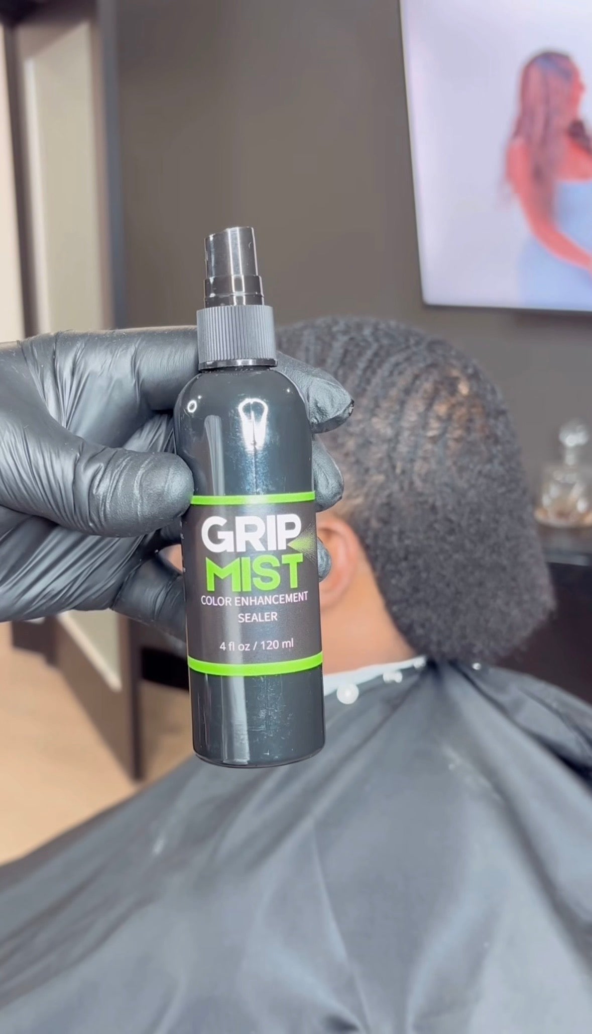 @thethomasbangura thethomasbangura holding a bottle of GripMist Color Enhancement Sealer