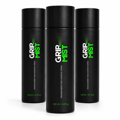 Three black bottles of Grip Mist on a white background